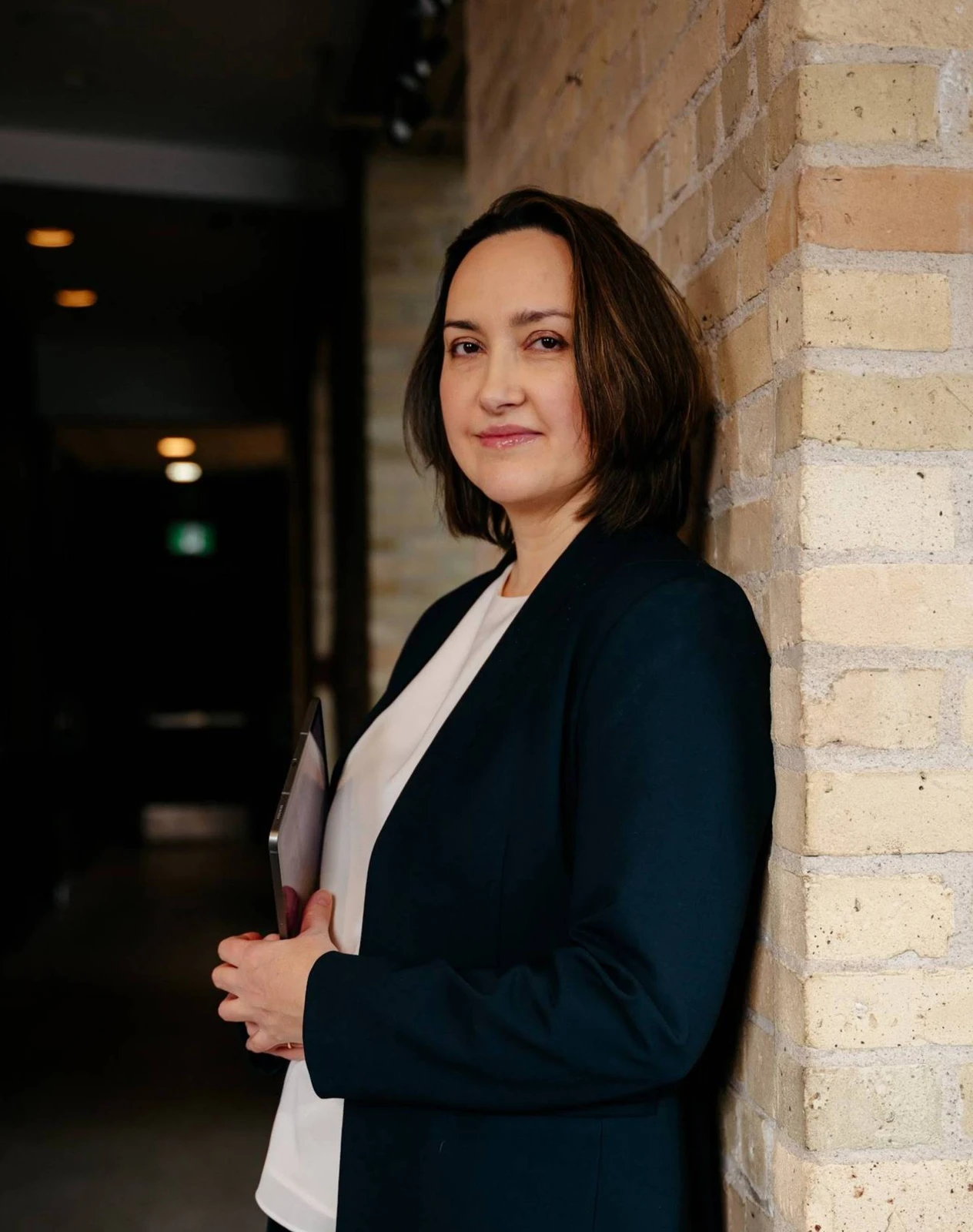 Margarita Serova in a navy blazer