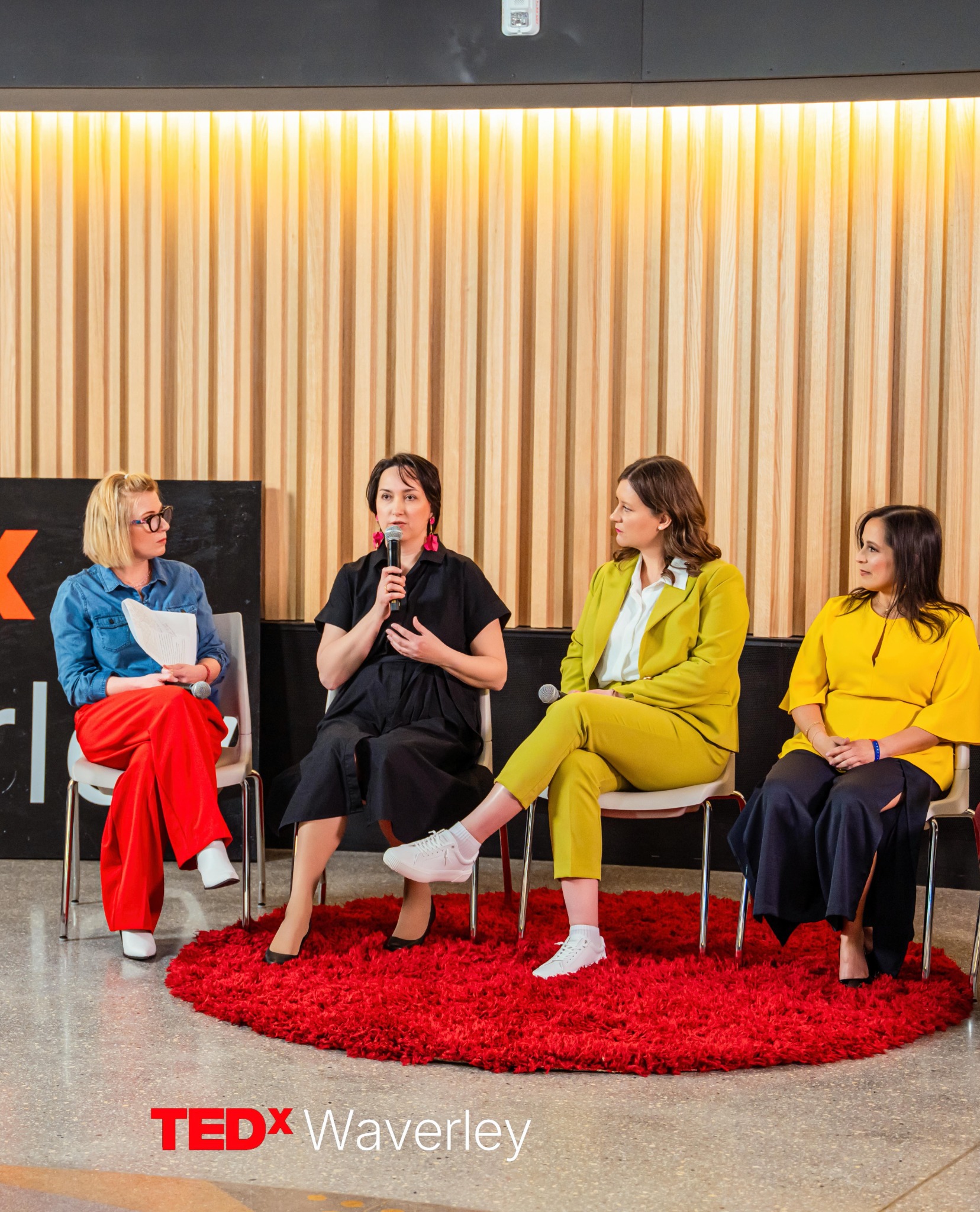 Margarita Serova speaking on a panel at TEDxWaverley