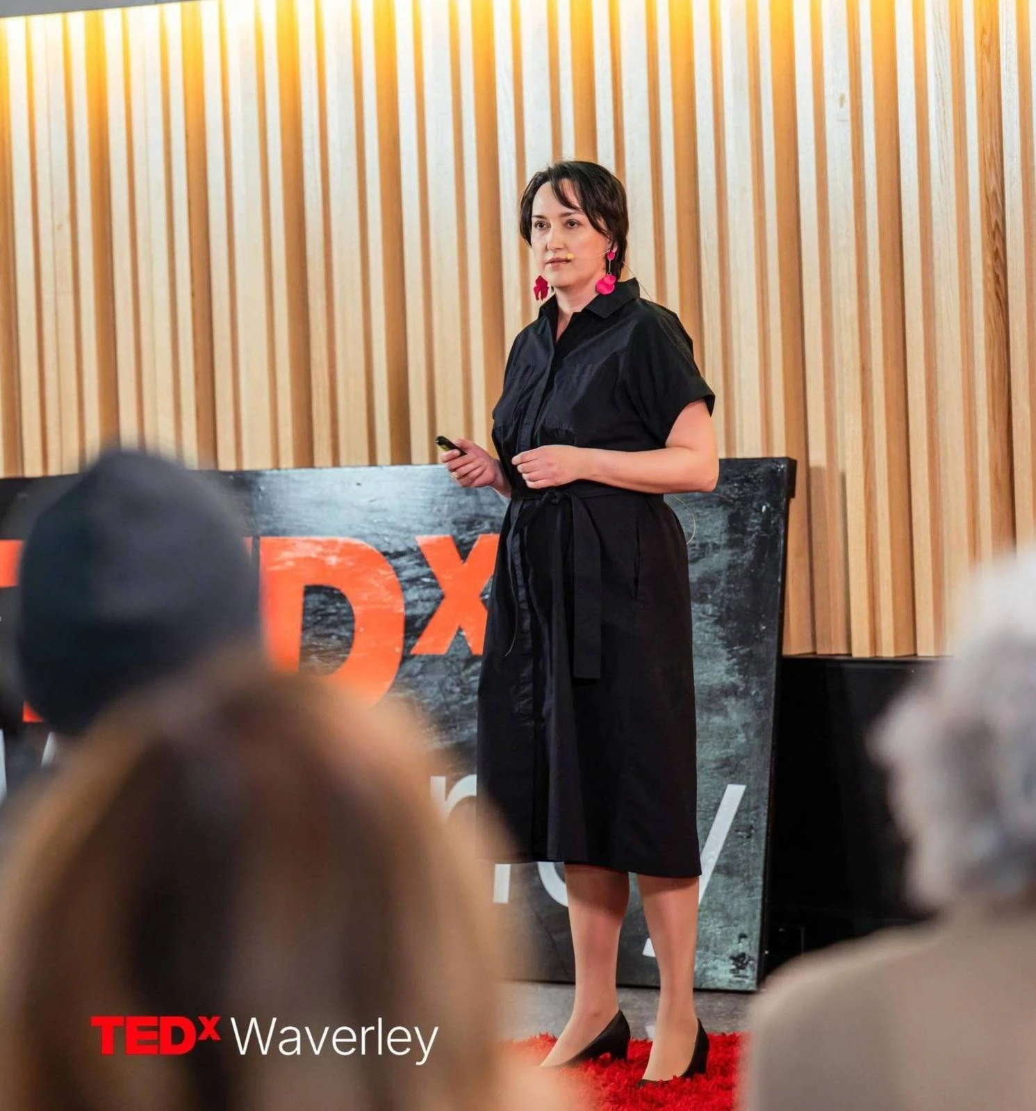 Margarita speaking on the TEDxWaverley stage